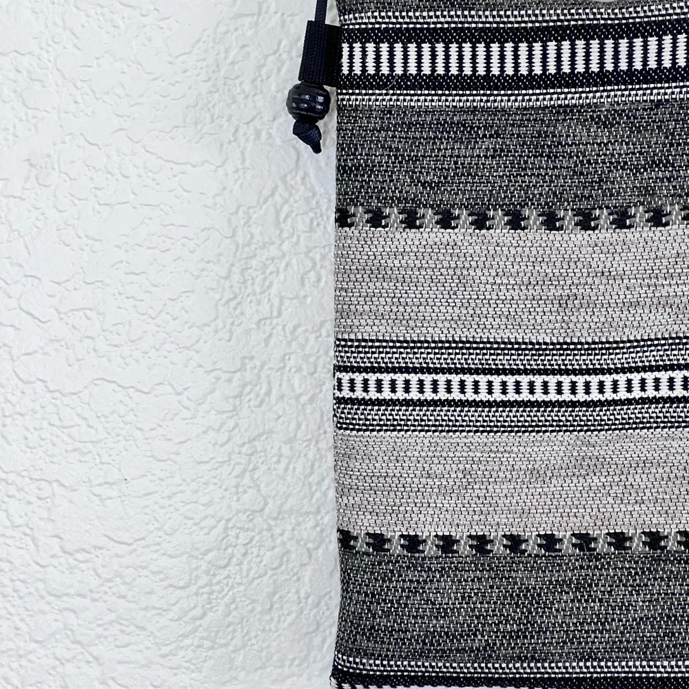 Like new black and white woven crossbody bag small